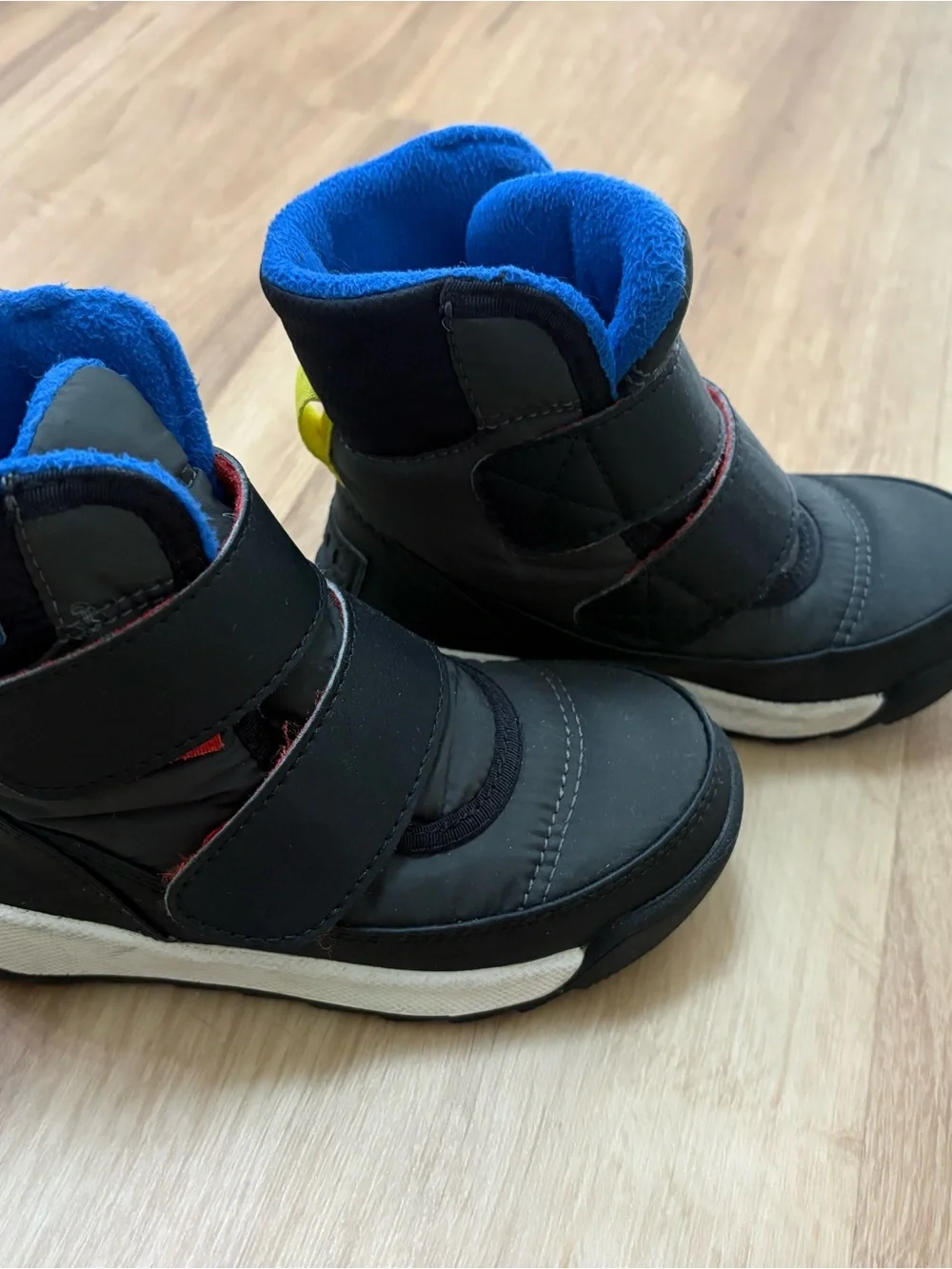 Sorel Kids Black Boots with Blue Fleece Lining